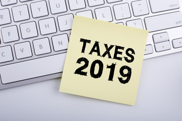 Taxes 2019 Concept On Sticky Note