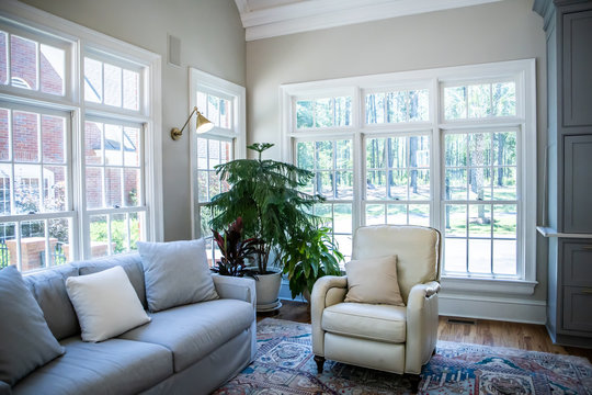 Open Concept Living Room Den with Vaulted Ceilings and Lots of Windows with a Neutral color palette