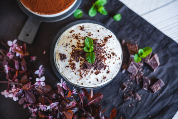 Delicious homemade chocolate cheesecake with cocoa and mint