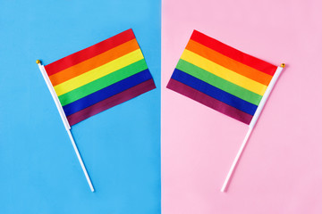 LGTB or rainbow flag. Gay pride flag on pink and blue background. 