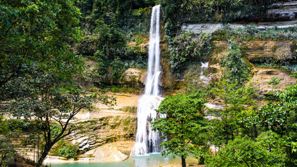 A giant waterfall found deep in the jungle on the island of Bohol, Philippines