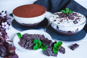 Delicious homemade chocolate cheesecake with cocoa and mint