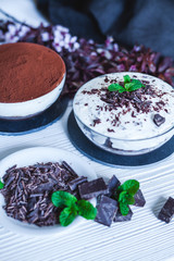 Delicious homemade chocolate cheesecake with cocoa and mint