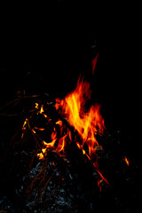 Fototapeta na wymiar orange fire on black background