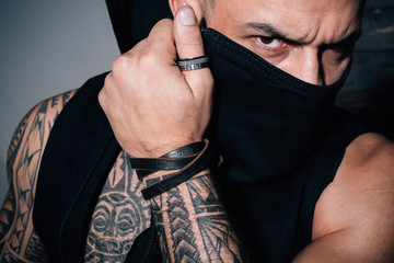 Fashion industry. Muscular athletic sexy male with tattoos. Confident and handsome brutal man. Male...