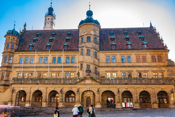 The beautiful town hall with its Renaissance facade at the market place of Rothenburg ob der...