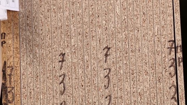 Drywall, dvp, chipboard, Shelf with structural materials on the shelves in the construction warehouse