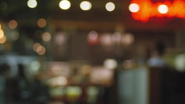 Blurred background of restaurant with abstract bokeh ligh