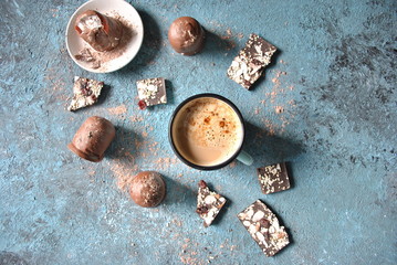 Cup of coffee, chocolate, cocoa powder 
