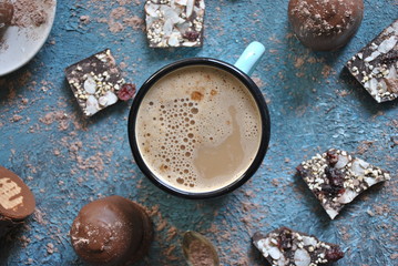 Obraz na płótnie Canvas Cup of coffee, chocolate, cocoa powder 