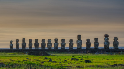 Sunrise clouds behind Moai statues of Ahu Tongariki on Easter Island
