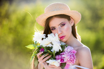 Natural beauty and spa therapy. Allergic to pollen of flowers. face and skincare. Travel in summer. Summer girl with long hair. Spring woman. Springtime and vacation. Woman with fashion makeup