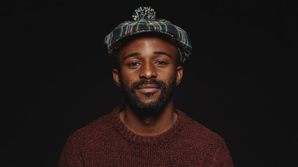 Close up of man wearing cap