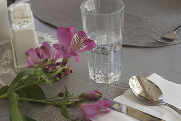 Glass of water with flower