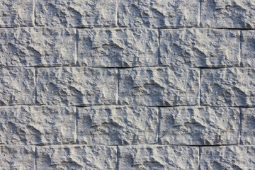 The texture of the wall of decorative brick gray