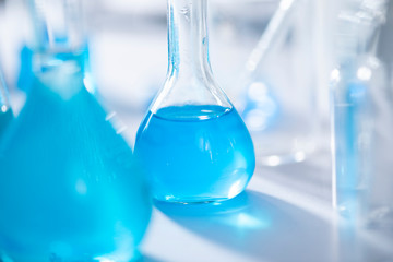 Chemical laboratory equipment Glassware for research and blue matter