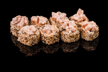 Sushi Roll - Maki Sushi pieces collection with Salmon Roe, Smoked Eel, Cucumber, Cream Cheese, Sesame, Avocado, Onion Fries, Crab Meat, Tobiko isolated on black background - Image