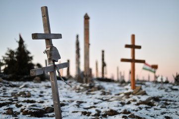 Wooden crosses on the top of a mountain in winter season