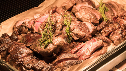 the buffet is the meat under the lamp