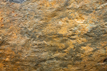 Rusty texture. Stone rusty background. Colorful granite stone background. Old Cracked Rusty Rough texture. Rock wall backdrop with rough red brown texture. Grunge Abstract Stone Surface. 