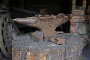 old anvil hammer, nails and horseshoes