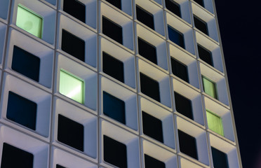 City windows at night.  Hotels and apartments for rent.