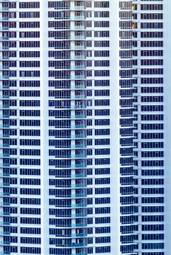 Highrise enormous condo building facade in white.  Ultra modern.