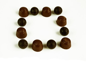 Chocolates, a box of candy on an isolated white background.