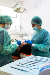 Dentists working in dental clinic