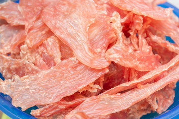 Dried meat 300 grams lies on plastic scales