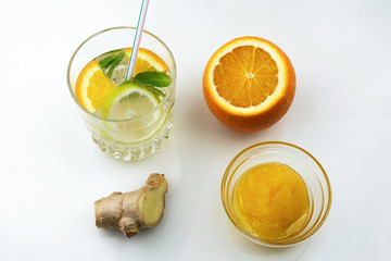 Glass of drink with citrus juice