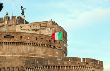 Fototapeta na wymiar Italian flag waving outside Castel Sant Angelo
