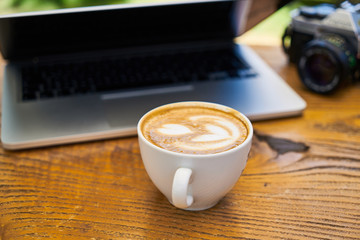 Delicious soft latte coffee on the table