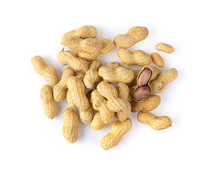 roasted peanut in shell closeup isolated on white background . top view