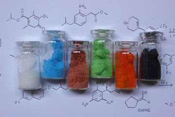 Colored metal salts: white zinc sulfate, blue copper sulfate, brown cobalt sulfate, green nickel...