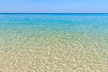 Crystal clear turquoise blue Andaman sea, Phuket, Thailand