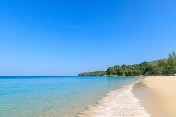 Foto op Canvas Crystal clear turquoise blue Andaman sea at Surin Beach, Phuket, Thailand © wirojsid