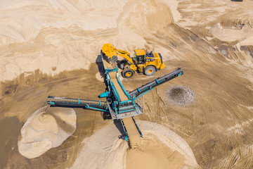 Gravel and sand open pit mining. Aerial view