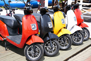 Electric scooters for rent in parking