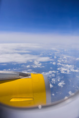 View of the plane turbine while flying.