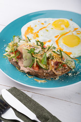 Fried eggs served for breakfas