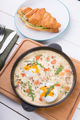 Stuffed croissant and shakshuka