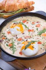 Stuffed croissant and shakshuka