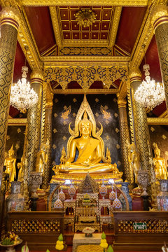 Phitsanulok, Thailand - December 30, 2018: Phra Buddha Chinnarat statue in chapel at Wat Phra Sri Rattana Mahathat (Wat Yai) Temple, one of most beautiful Buddha statue in country.