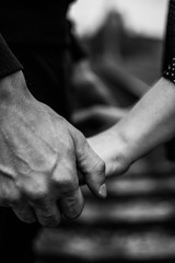 the couple holding hands at the railway - 268390073