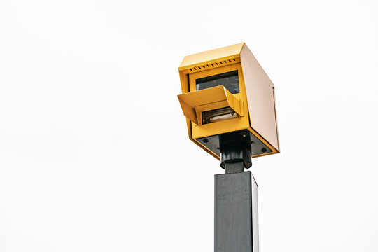 A typical radar trap or speed camera on white background