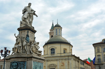 Fototapeta na wymiar Turin, Piedmont/Italy - The statue of the italian politician Camillo Cavour in the Carlo Emanuele II Square, also named Carlina.