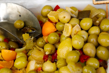 Mixture of olives with additives is ready for sale