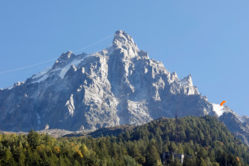 There is rocky peak of Aiguille du Midi