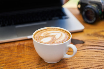 Delicious soft latte coffee on the table